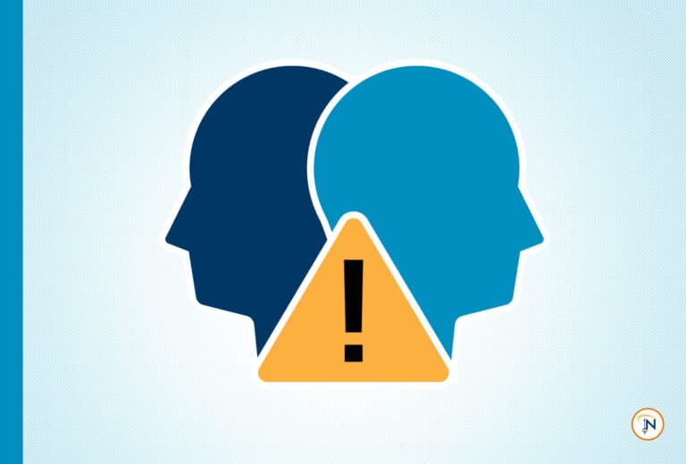 Two blue heads with a yellow, triangular caution symbol