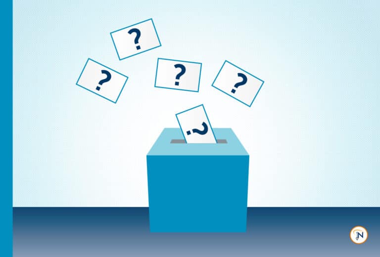 Question cards being placed into a slot box