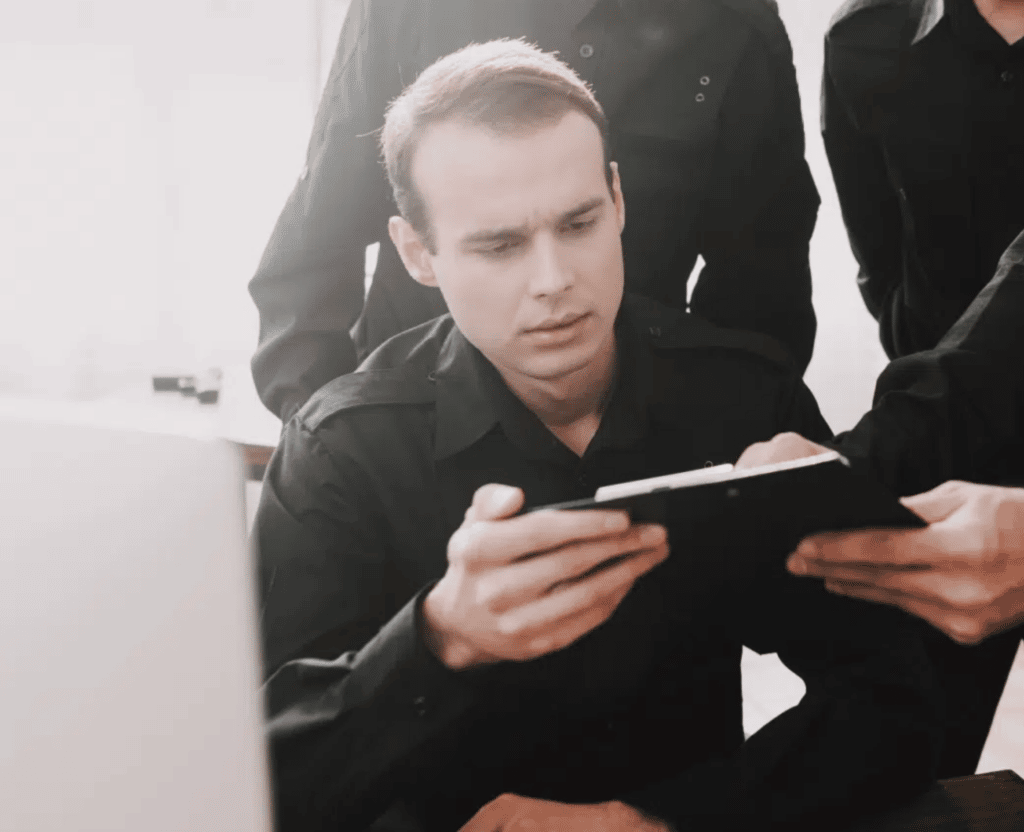 Corrections Officers Reviewing Data