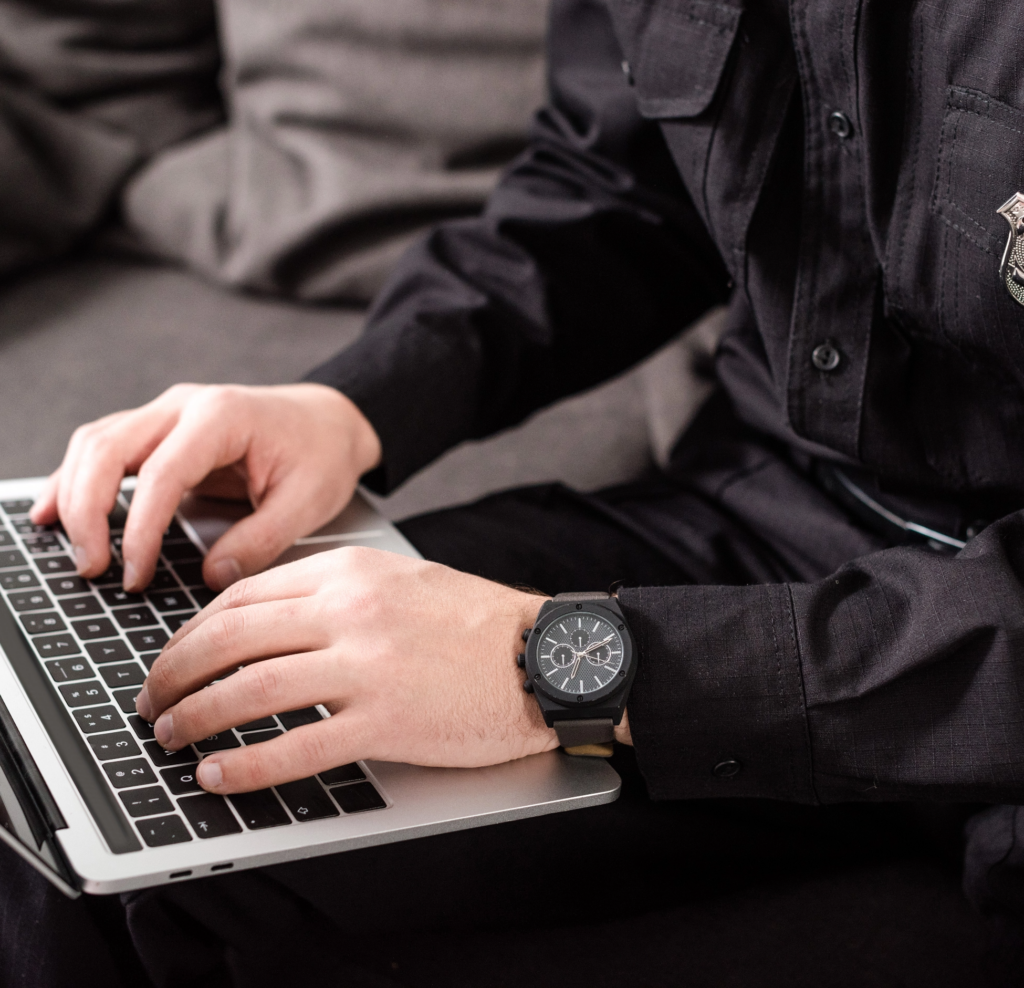 Prison Guard on a Laptop