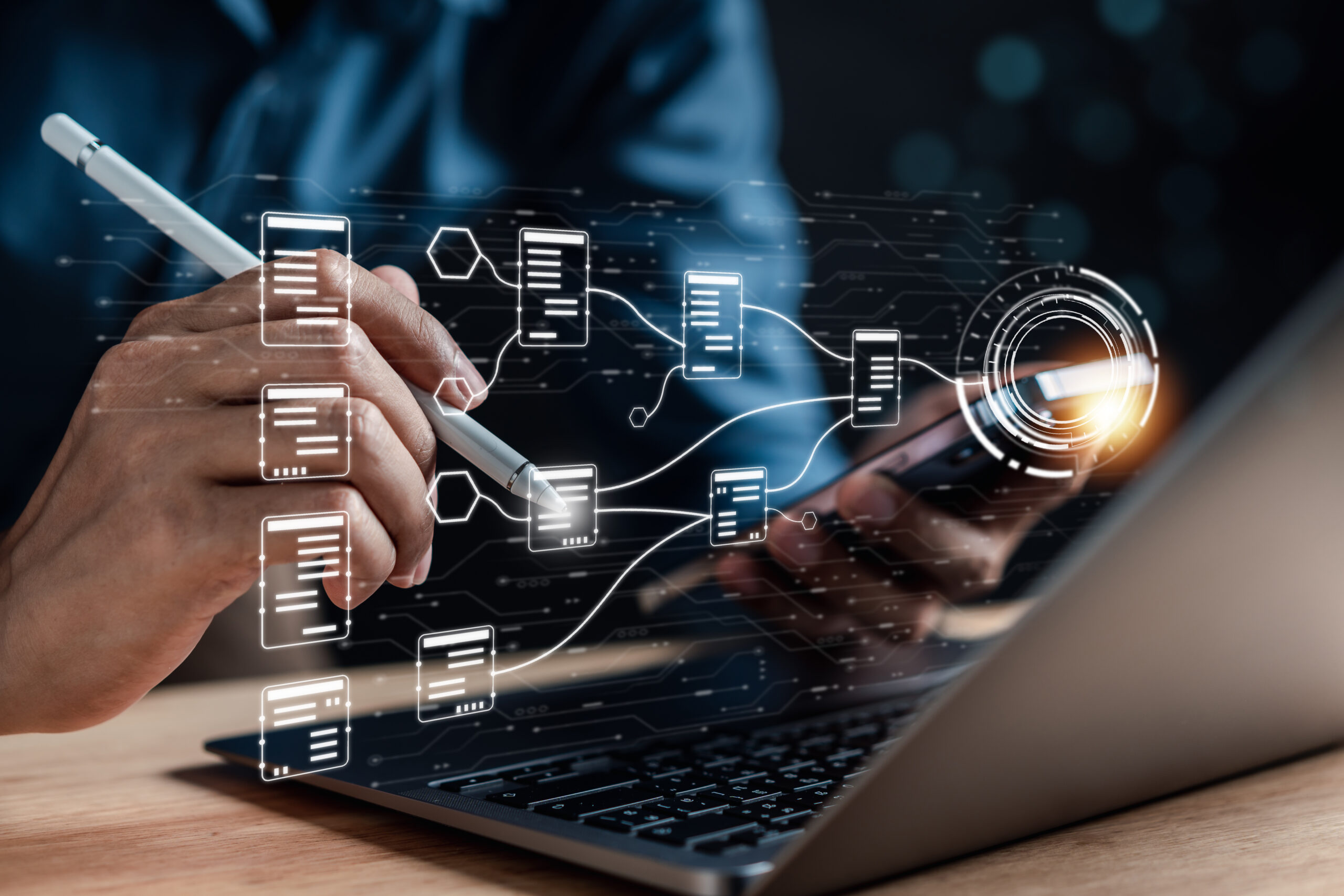 Rendering of a digital file system appearing above a business person's laptop