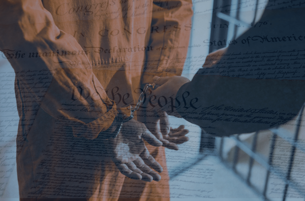 Inmate being placed in handcuffs with an overlay of the Declaration of Independence